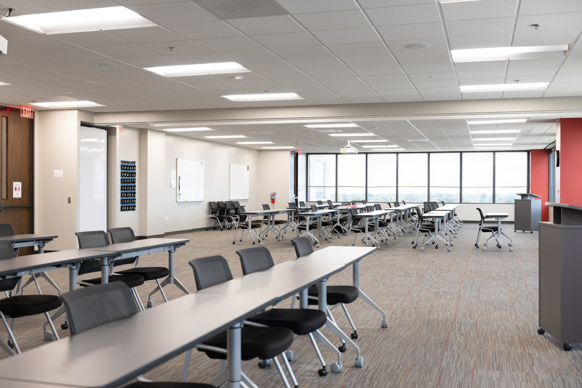 classroom with tables and chairs